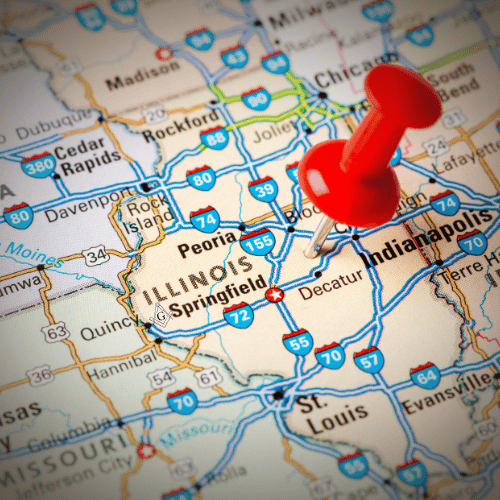 Picture of a State Map of Illinois, with a Square and Compass next to Springfeild where Grand Lodge is located