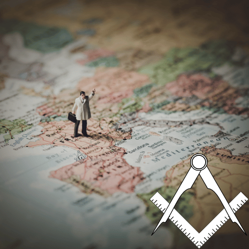 Figure of man standing on map in France, Freemasonry Square and Compass in conor