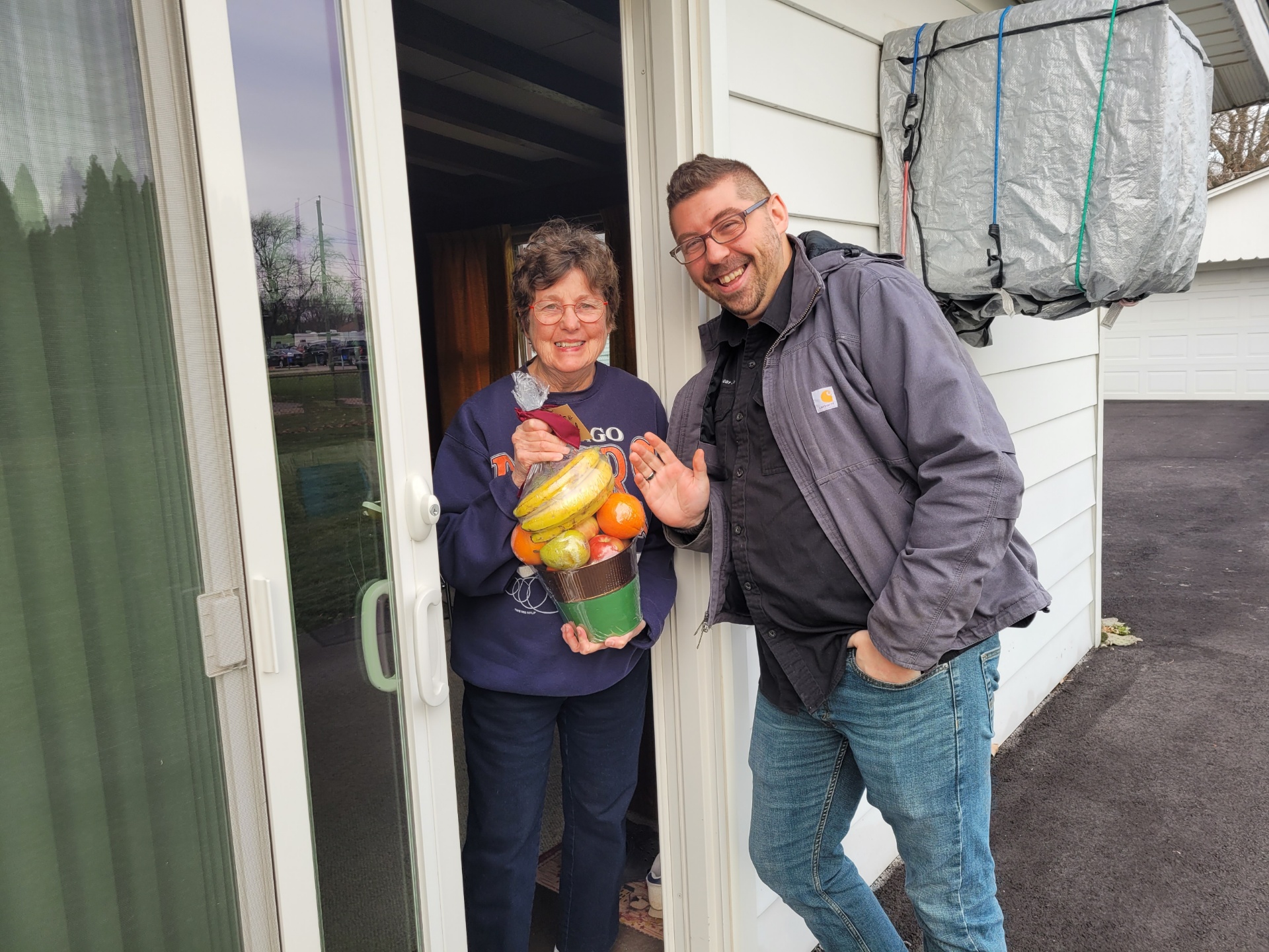 Brother Armour Dropping of a Fruit Basket to one of our Widows for Christmas